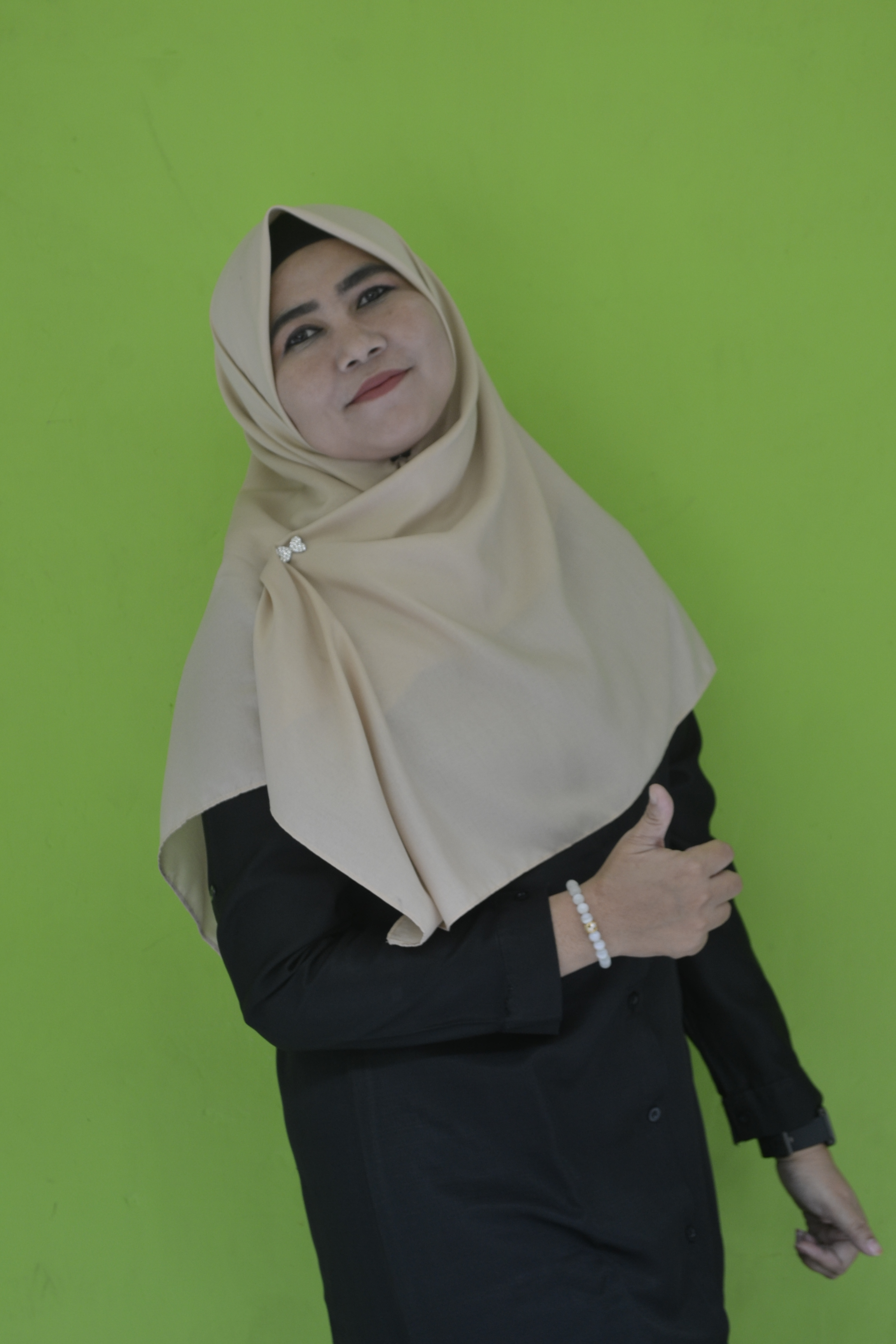Munik Lindawati, S.Pd.I